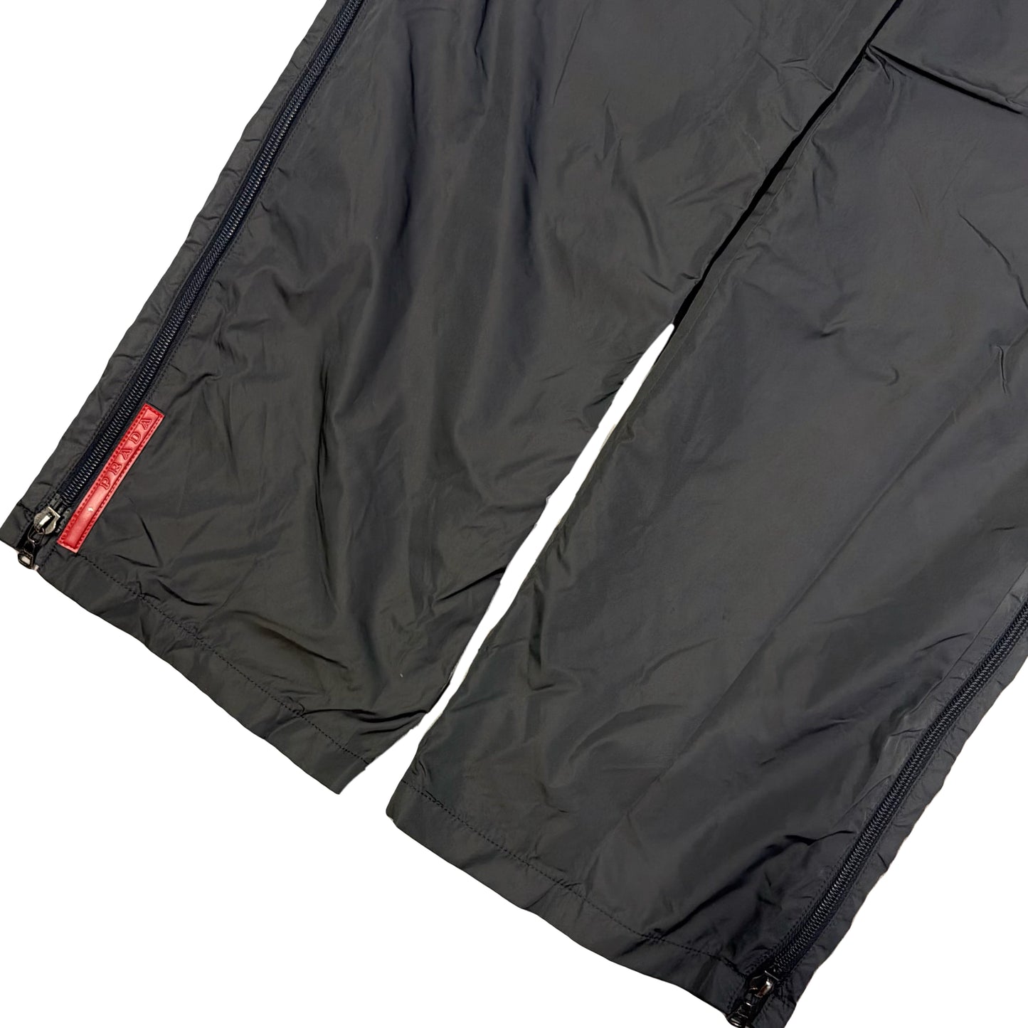 Prada Sort Full Zip Nylon Trousers In Charcoal Grey (W32)