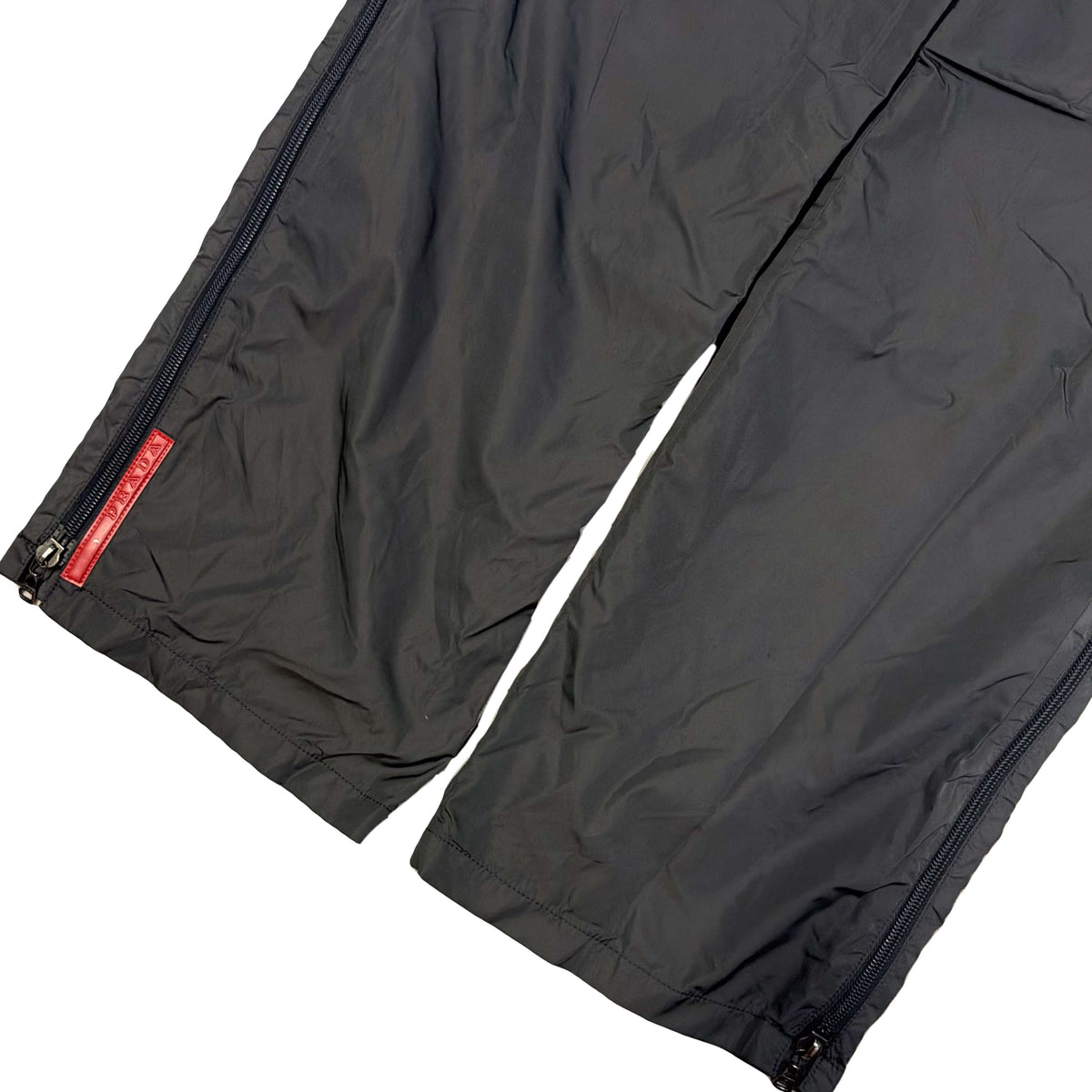 Prada Sort Full Zip Nylon Trousers In Charcoal Grey (W32)
