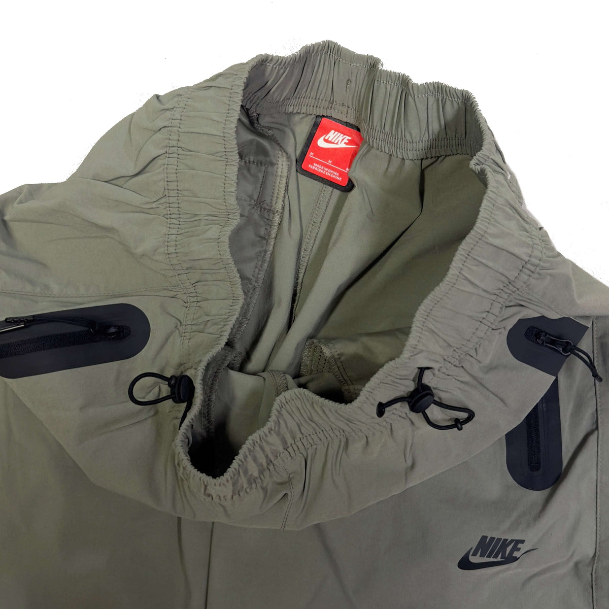 Nike Woven Tech Loose Fit Bottoms In Olive Green (M)