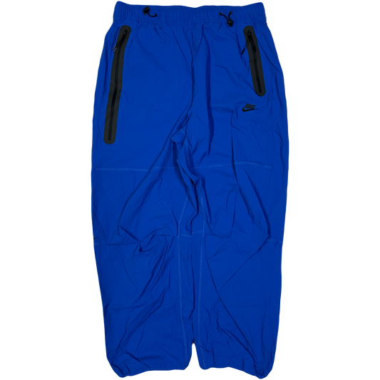 Nike Woven Tech Loose Fit Bottoms In Blue ( L )